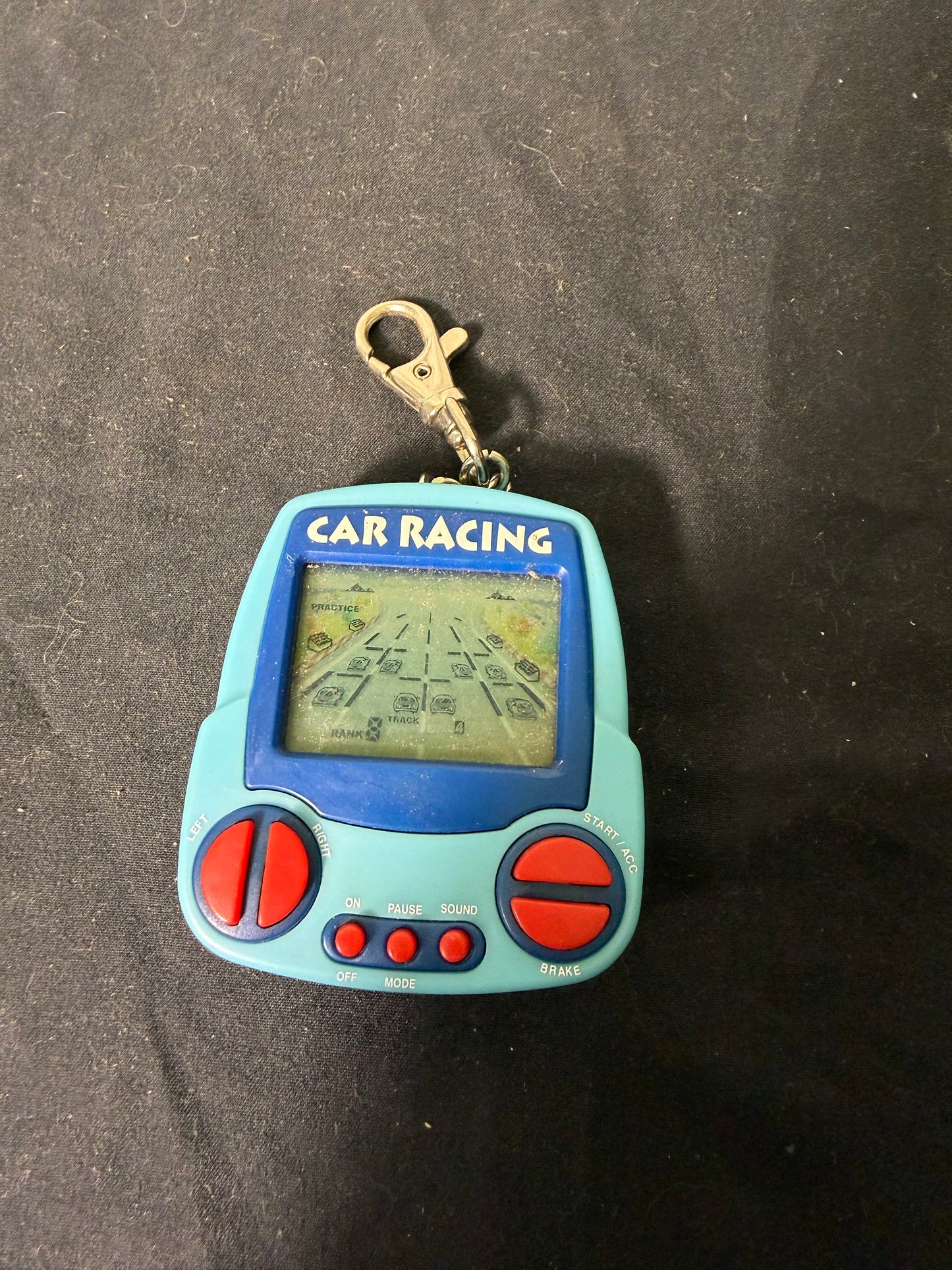 MGA Entertainment Inc. Car Racing Plastic Keychain Game