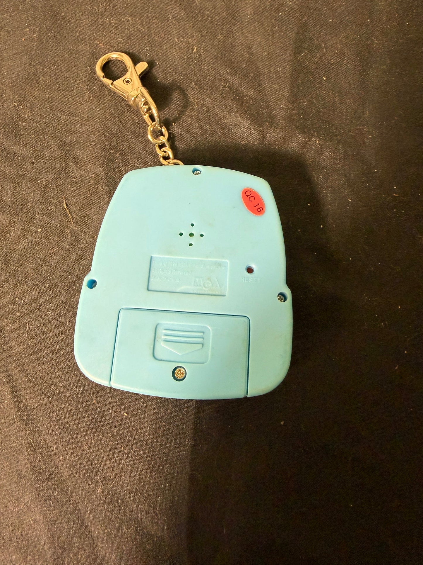 MGA Entertainment Inc. Car Racing Plastic Keychain Game