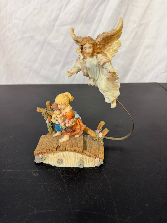 Angel Figurine with Children on Bridge